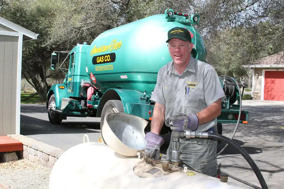 American River Gas driver filling a residential propane tank
