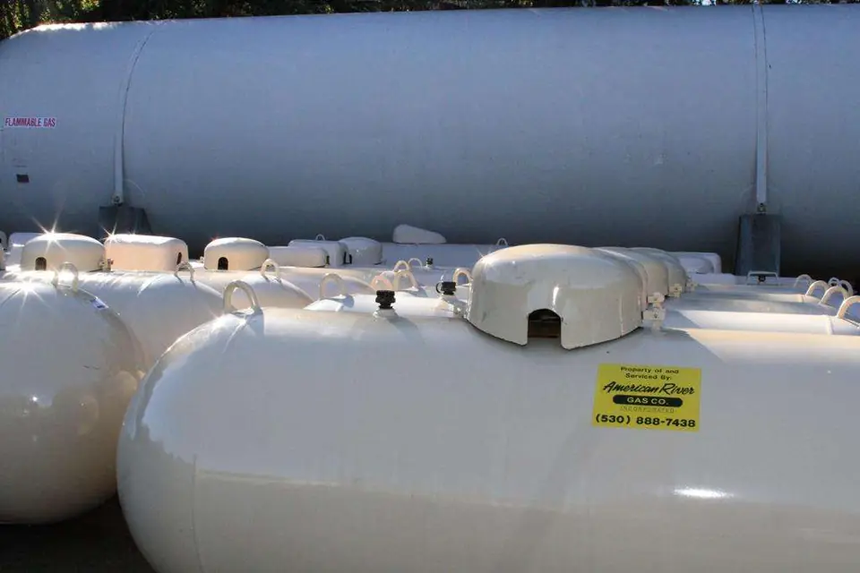 New propane tanks lined up at the yard