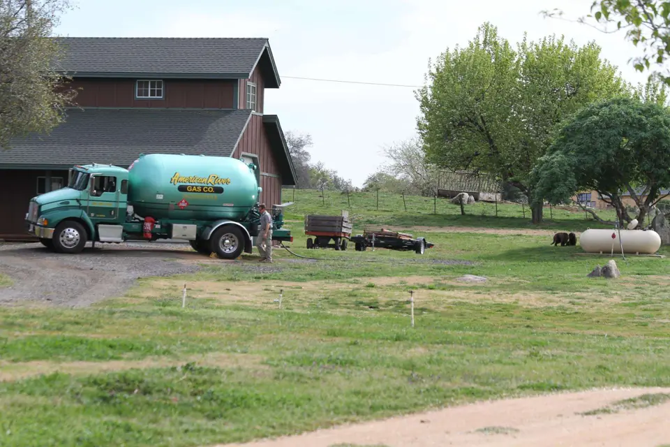 American River Gas bobtail truck delivering to a foothill home